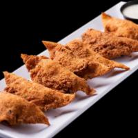 Buffalo Chicken Bites · NEW-buffalo chicken mix in wonton wrappers, lightly floured & deep-fried served with ranch o...