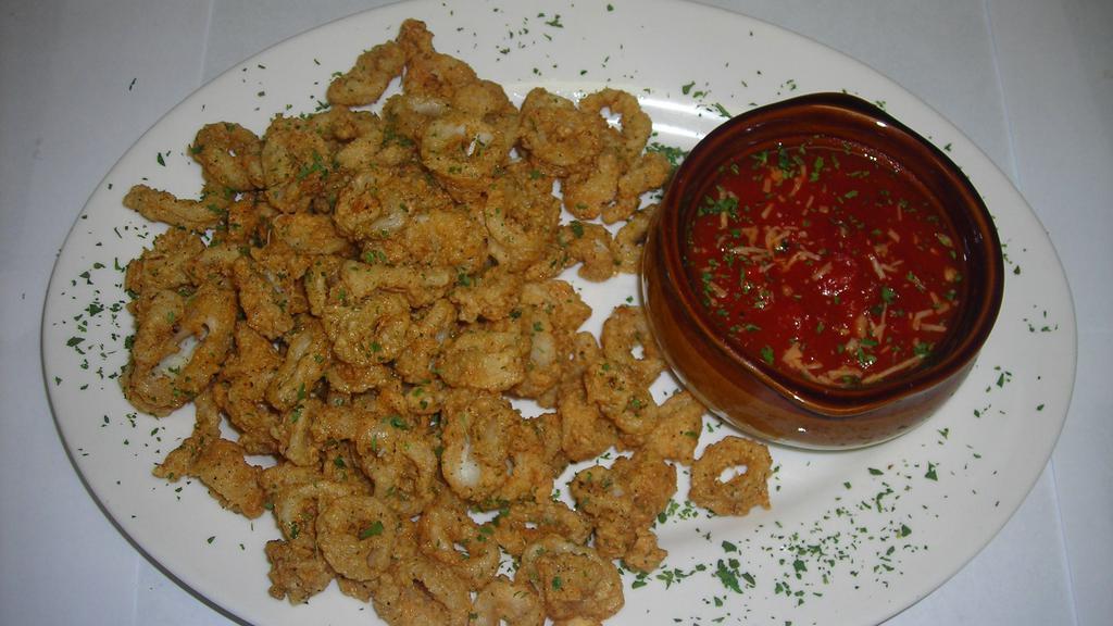 Fried Calamari · With marinara sauce.