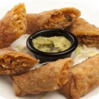 Spicy Chicken Egg Rolls · Our spicy stuffing wrapped in mini egg rolls, served with guacamole.