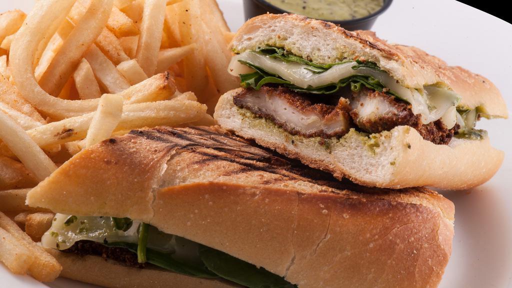 Creamy Pesto Chicken · New. Breaded chicken with creamy pesto sauce, fresh spinach, and mozzarella cheese, pressed in an Italian roll.