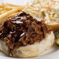 Pulled Pork Sandwich · NEW-pulled pork cooked with BBQ sauce, served with cole slaw on a brioche bread