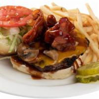 Bbq Burger · Bacon, cheddar cheese, sautéed mushroom, BBQ, lettuce, and tomato.
