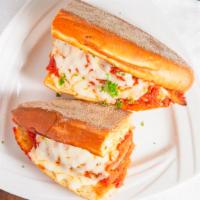 Chicken Parmigiano Sandwich · An Italian classic with crispy chicken covered in warm marinara sauce and topped with melted...