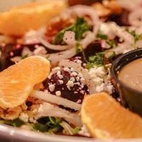 Beet Salad · Vegetarian. Roasted beets over arugula with oranges, onions, feta cheese, walnuts. Served wi...
