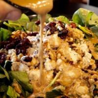 Spinach Salad · Vegetarian. Baby spinach leaves topped with onions, walnuts, cranberries, goat cheese and a ...