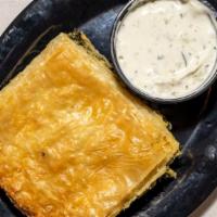 Spanakopita Combo · Vegetarian. Feta cheese and spinach pie, nestled in layers of filo dough and baked until gol...