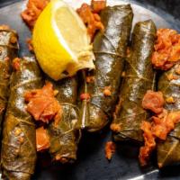 Grape Leaves Hs · Lean meat and rice with Middle Eastern spices rolled in grape leaves.