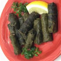Grape Leaves (8) · Stuffed with rice and beef.