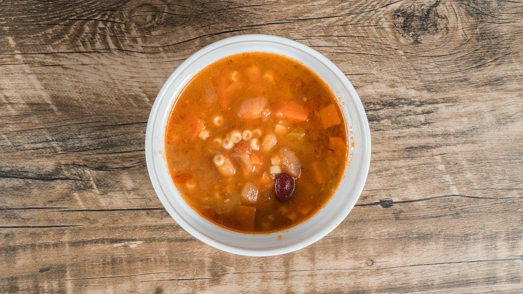 Pasta Fagioli · Pasta, tomatoes, white and red beans, chicken stock, carrots, celery, prosciutto, onions, salt, and pepper.