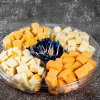 Mini Cheese Tray · Mild Cheddar, Dutch Gouda, Muenster, and Swiss.