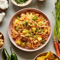 Red Coconut Curry (V, Gf) · Rice noodles, roasted tofu, pineapples, jalapeños, carrots, scallions, cilantro, and our red...