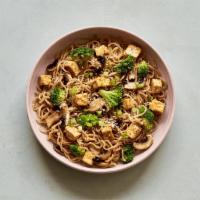 The Vegan Sesame Garlic Stir-Fry (V) · Freshly made whole wheat noodles, roasted tofu, mushrooms, broccoli, scallions, toasted sesa...