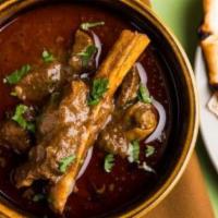 Goat Rogan Josh · Classical North Indian dish cooked in cardamom sauce
