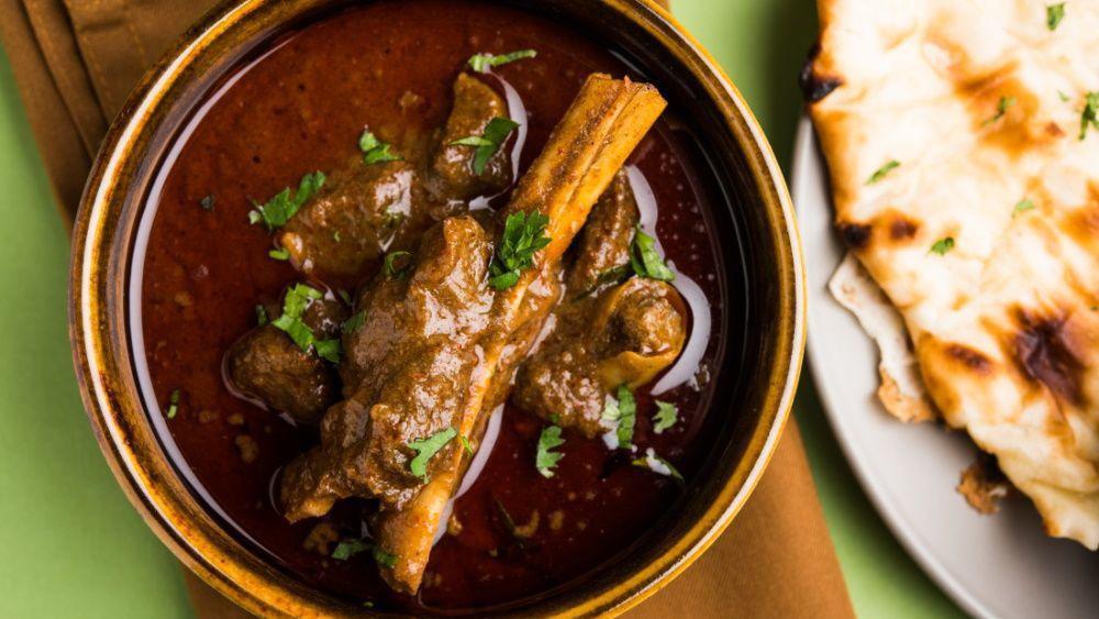 Kadai Goat · Goat cooked with bell peppers, onions and tomatoes with a touch of creamy and onion gravy
