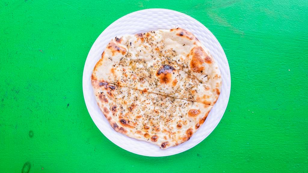 Naan · Traditional Indian bread baked in clay oven