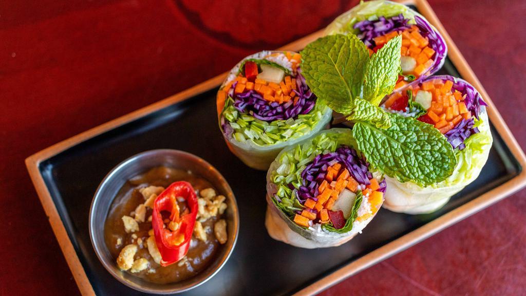 Summer Rolls · Shrimp, vermicelli noodles, cucumber, lettuce, mint, cilantro and bell pepper, wrapped in rice paper and served with a crushed peanut hoisin sauce. (4 pieces)