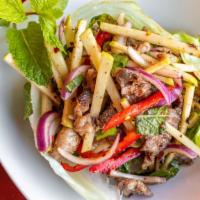 Beef Salad - Spicy · Grilled flank steak tossed with green apple, shallot, bell pepper, mint and toasted rice, se...