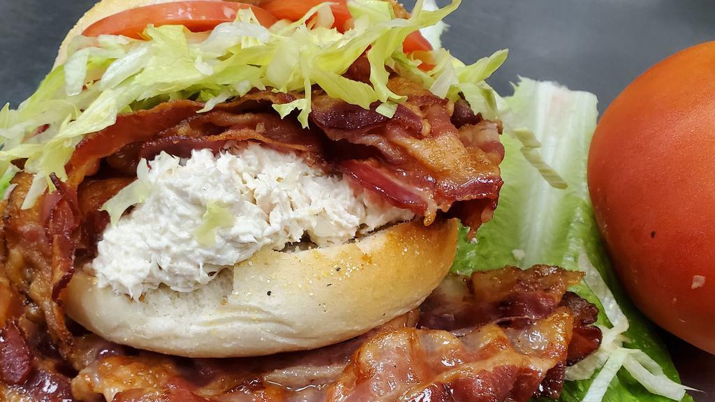 Turkey Time Or Chicken Time · Turkey or chicken salad, bacon, lettuce, tomato, and mayonnaise.