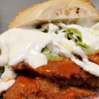 Buffalo Bill · Chicken cutlet, hot sauce, lettuce, and blue cheese dressing.