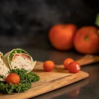 The Oceansider · Turkey Breast, Alpine Lace Swiss, Avocado and coleslaw on your choice of wrap.  Served with ...