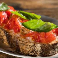 Bruschetta · garlic, sea salt, crushed tomato, homemade toasted bread, Felice extra virgin olive oil