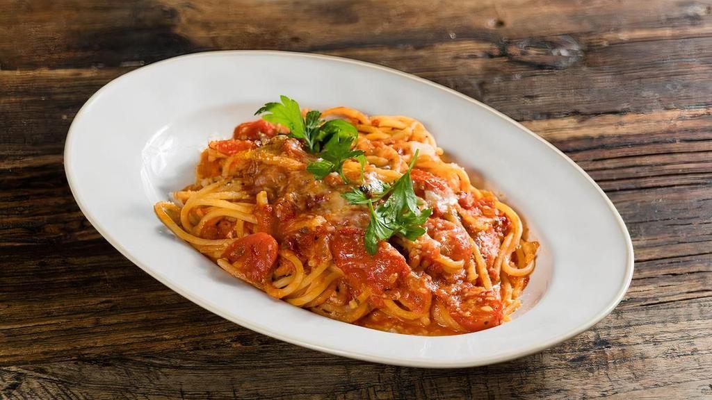 Spaghetti All'Arrabbiata · San Marzano tomato sauce, garlic confit, peperoncino, cherry tomatoes, Parmigiano-Reggiano