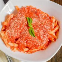 Pasta Pomodoro · Choice of penne, spaghetti, or fettuccine. House made tomato sauce.