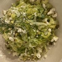 Marouli Salad · Shredded lettuce, dill, scallions, capers, red onion, graviera cheese and vinaigrette