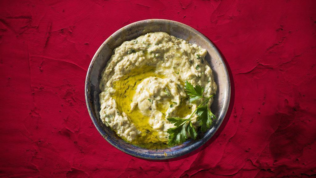 Baba Ganoush Daddy · A blend of fresh Char-Grilled eggplant, blended with tahini, garlic, lemon juice, and parsley