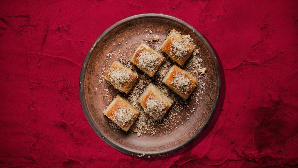 Baklava Blast · A rich dessert pastry composed of layers of flaky dough, filled with chopped nuts and held together with honey.