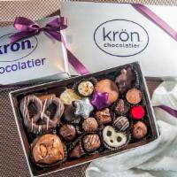 Gift Boxes · Our signature Kron chocolate collection arrives in a silver gift box wrapped and tied with p...