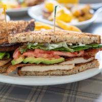 Chicken, Avocado And Bacon Club · Chicken, avocado, bacon, lettuce, tomato, and mayo on multigrain bread.