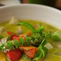 Green Curry · Fresh green chili, coconut milk, bamboo shoots, bell peppers, string beans, eggplants and ba...