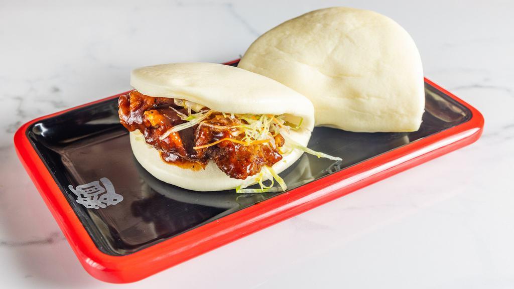 Marbled Pork Bun · Cabbages and mayonnaise with spicy sauce, (contains peanuts).