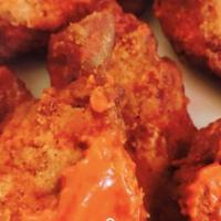 Buffalo Wings 6 Pieces · Served mild, medium or hot with a side of blue cheese.