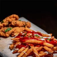 Chik'N Tenders (3) With Fries · Get a serving of three fresh, crispy, and golden-brown chicken tenders fried with a side of ...
