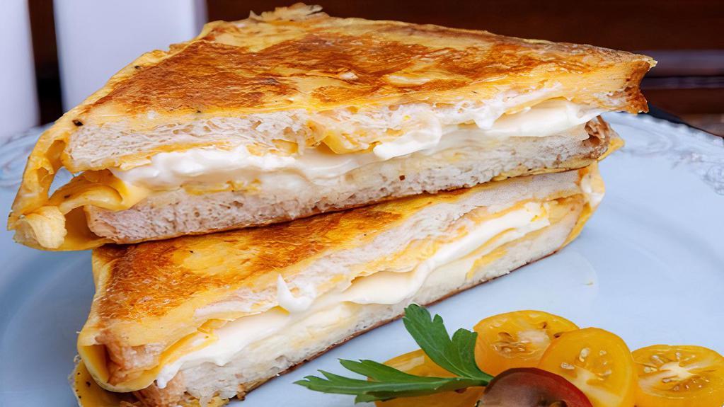 Egg Sandwich · Delicious Breakfast sandwich topped with 2 cooked eggs. Served on customer's choice of bread.