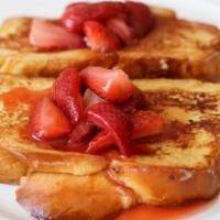 Strawberry French Toast · 3 slices of Grilled classic French Toast cooked to perfection, topped with fresh strawberries.