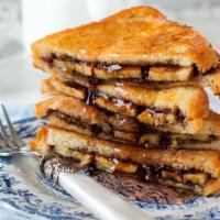 Chocolate French Toast · 3 slices of Grilled classic French Toast cooked to perfection, topped with chocolate chips.