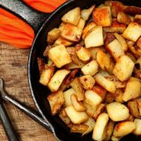 Home Fries · Cubed potatoes salted and fried to perfection.