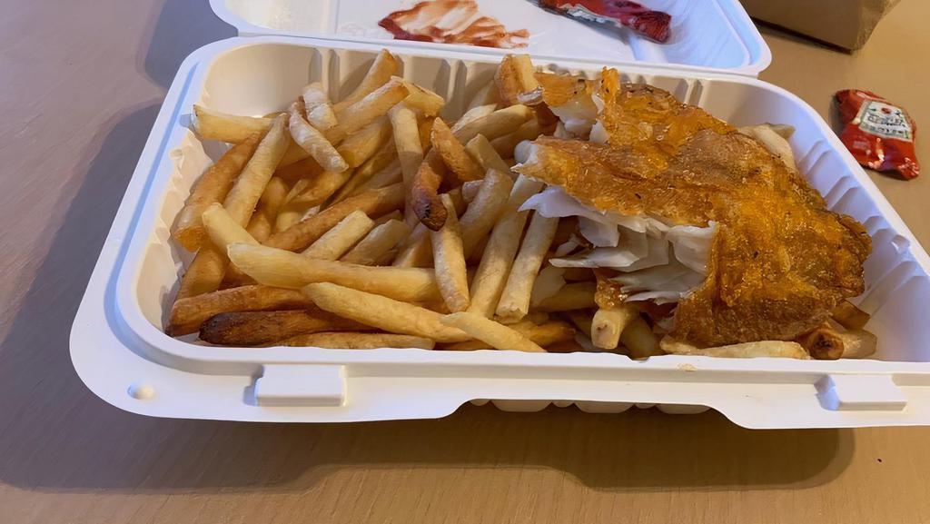 Tilapia Fish With French Fries · Served with ketchup and BBQ sauce.