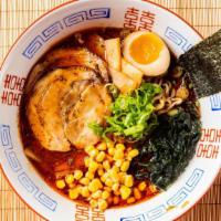Tonkotsu Spicy Ramen · House-made spicy pork bone noodle soup with salt, toppings comes with braised chashu, marina...