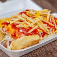 Hot Dog Dominicano ($5) · res/pollo, repollo, maiz, papas, queso, ketchup, and mayo.