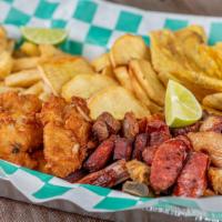 Combo $18 · Servido con Tostones, Batatas o Papas Fritas.