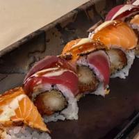 Double Pepper Roll · Shrimp tempura and spicy tuna top with pepper tuna and salmon with eel sauce and wasabi mayo...