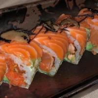 Triple Salmon Roll · Pepper salmon and spicy salmon avocado top with king salmon truffle and miso.