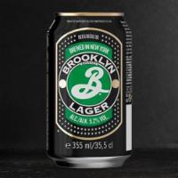 Brooklyn Lager Can · Hoppy Amber Red Lager - Brooklyn, NY - 5.2% ABV - 12oz Can - Brooklyn Lager is amber-gold in...