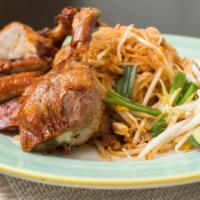 Crispy Duck Pad Thai · Stir-fried rice noodles with egg, bean sprout, scallion with traditional sauce and ground pe...