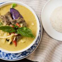 Green Curry · Medium. Green curry paste, bamboo shoot, eggplants, bell pepper, fresh basil and coconut milk.
