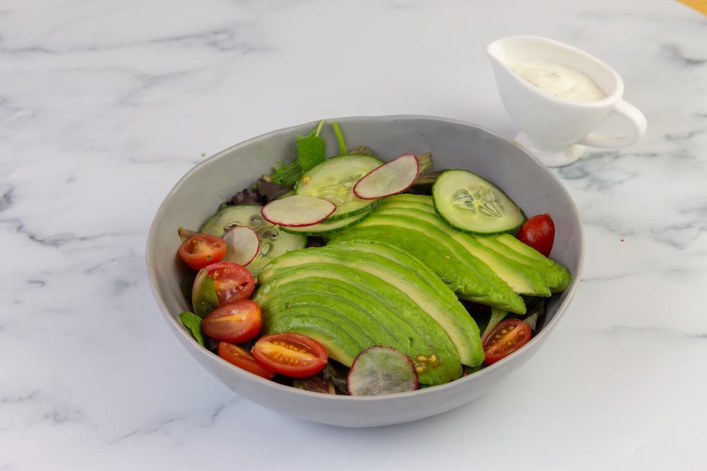 Avocado Salad · Avocado, grape tomatoes, and cucumbers, with ginger sauce.